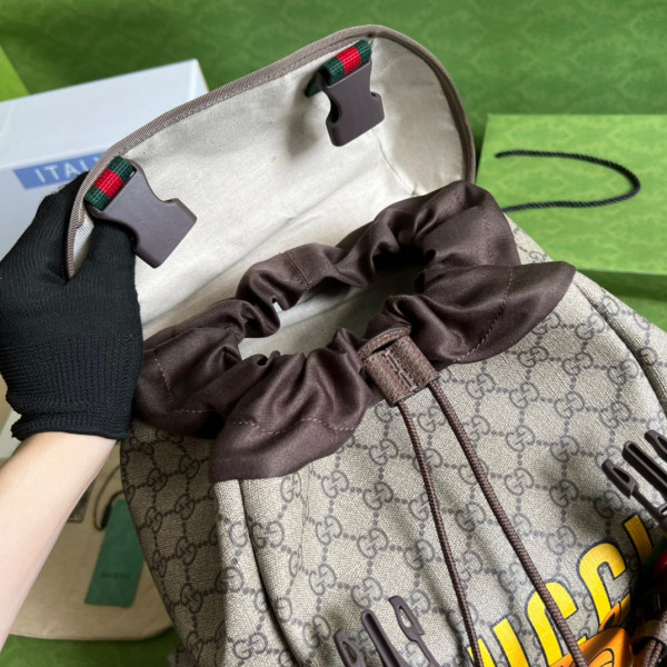 G*u*i cat print skateboard backpack