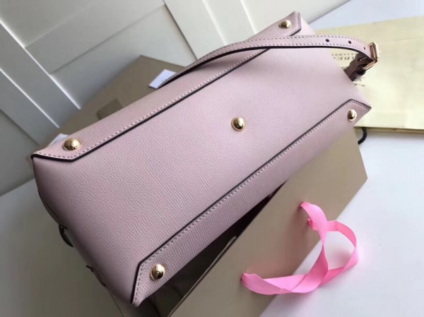 B**rry the medium banner in leather and house check