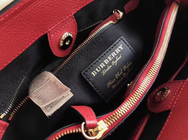 B**rry the medium banner in leather and house check