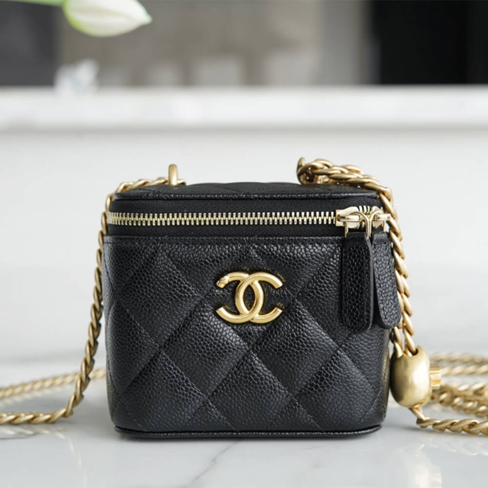 Ch*el small gold ball makeup bag