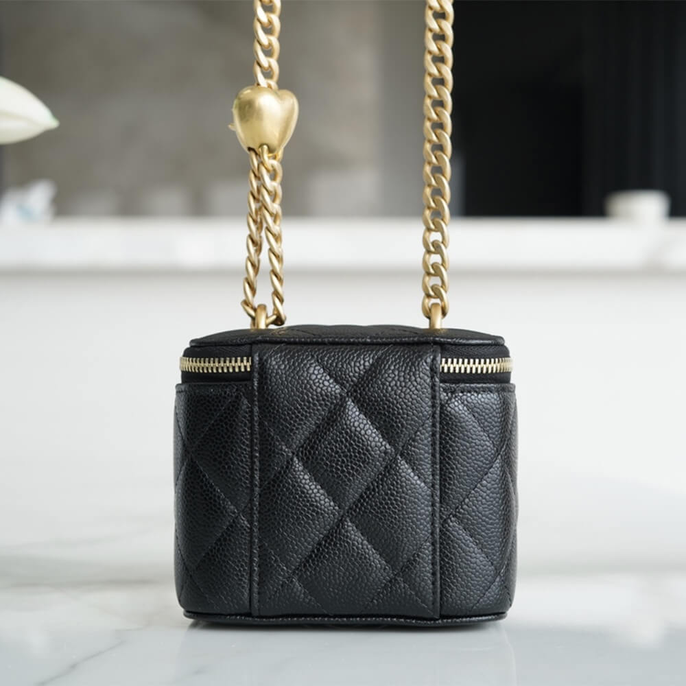 Ch*el small gold ball makeup bag