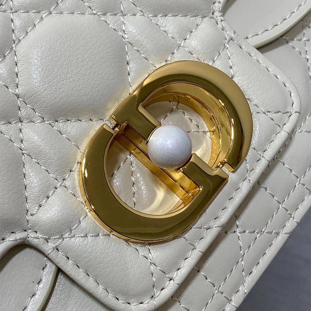 small D*or jolie top handle bag