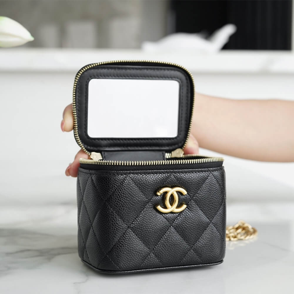 Ch*el small gold ball makeup bag