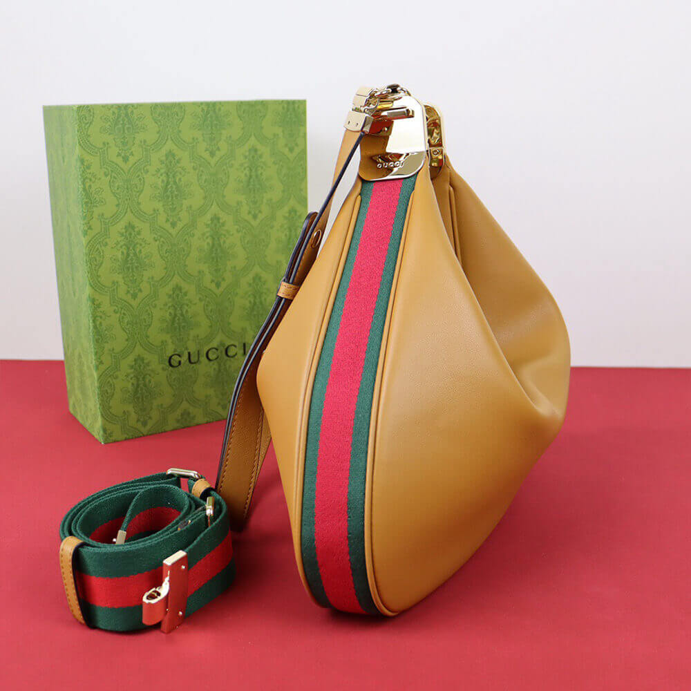 G*u*i attache large shoulder bag