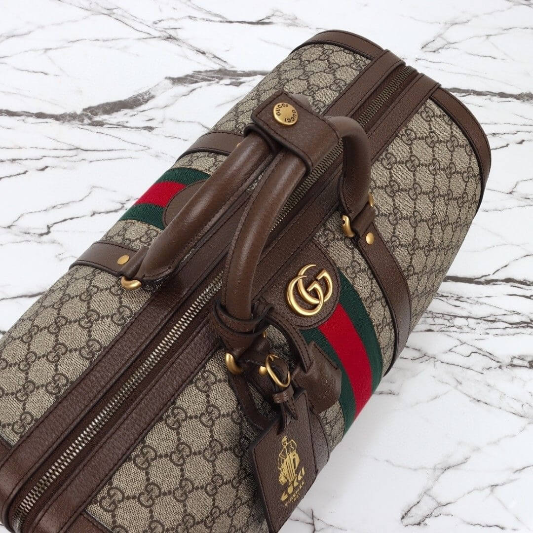 G*u*i savoy medium duffle bag