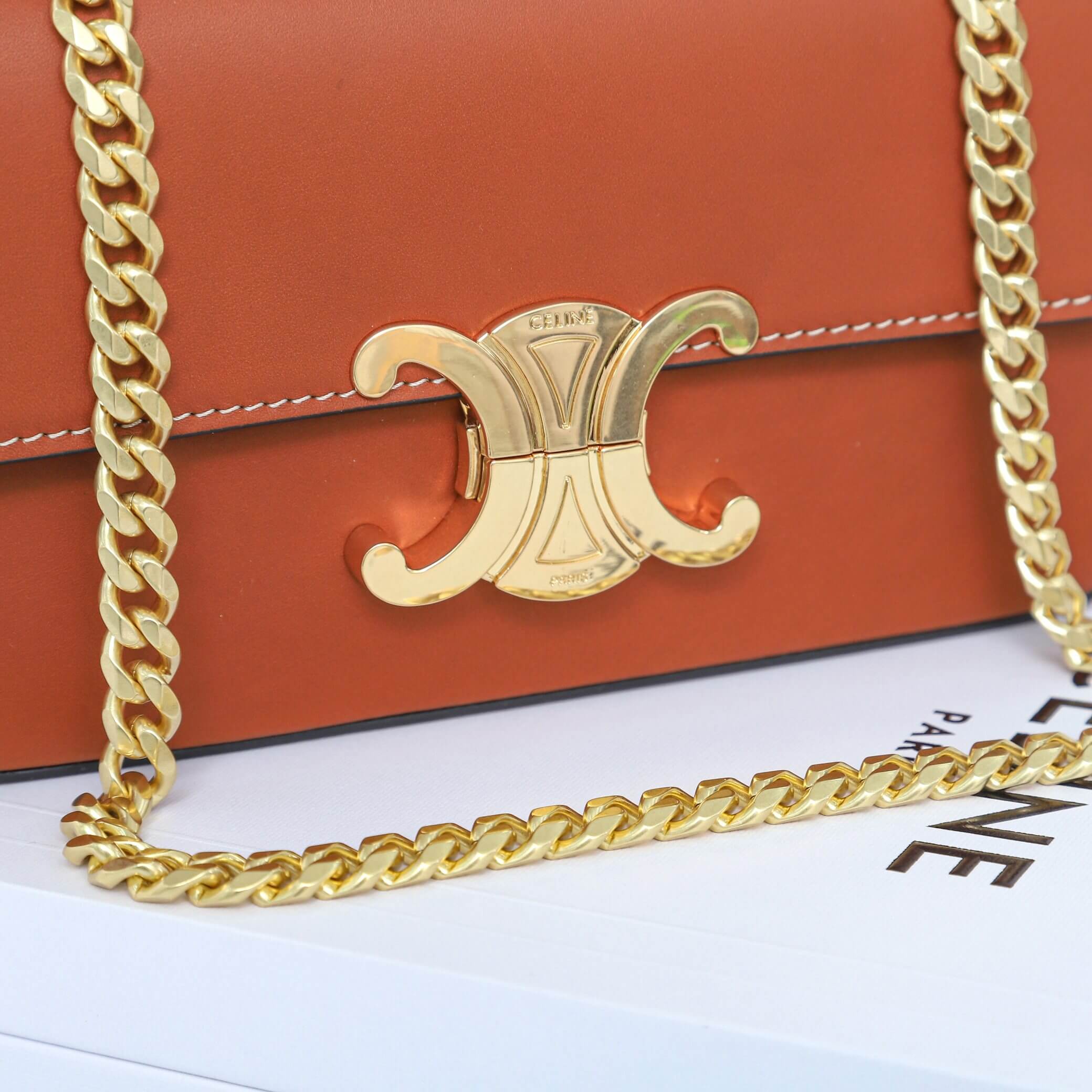 Ce**e claude shiny cowhide leather chain shoulder bag