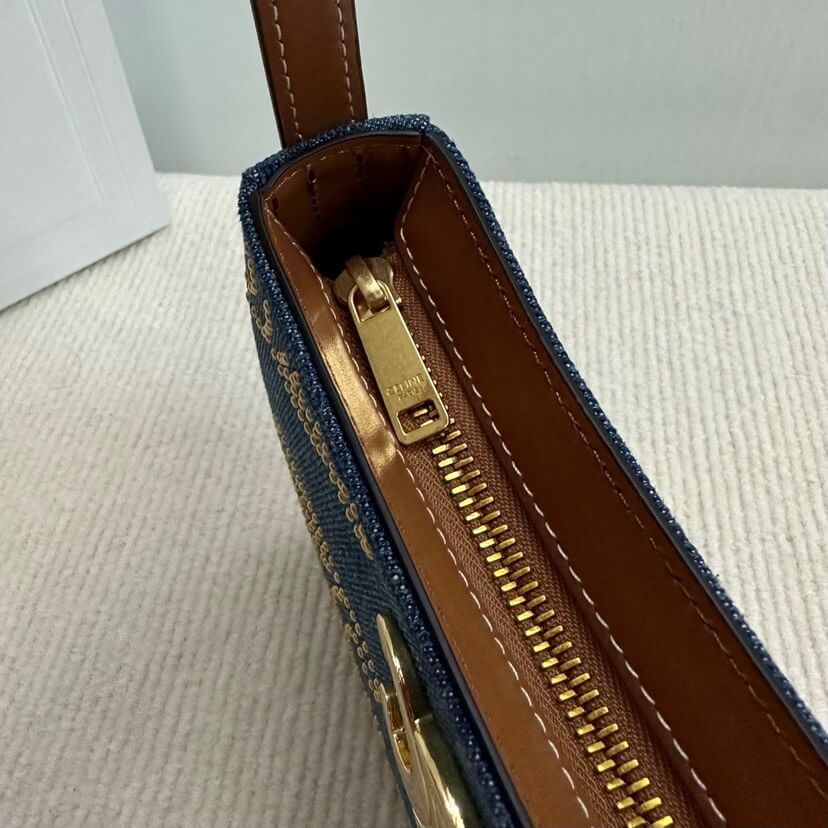 Ce**e tilly triomphe medium bag in studded denim and calfskin