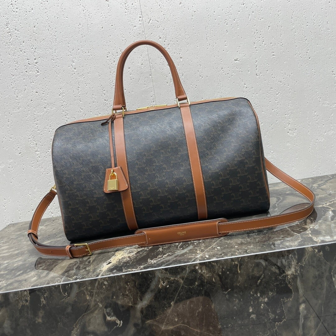 Ce**e medium duffle bag in logo-print calfskin