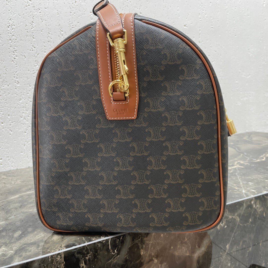 Ce**e medium duffle bag in logo-print calfskin