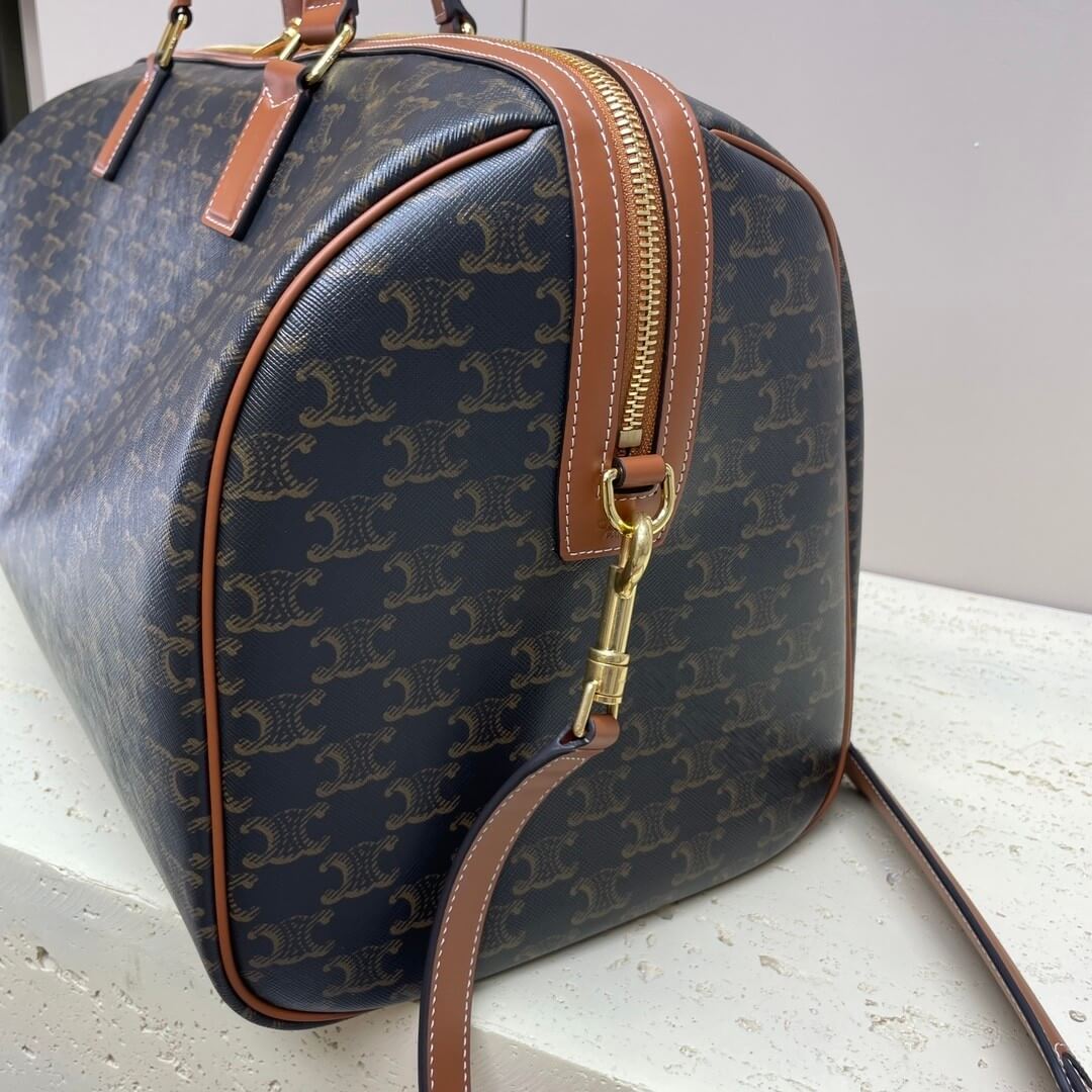 Ce**e medium duffle bag in logo-print calfskin