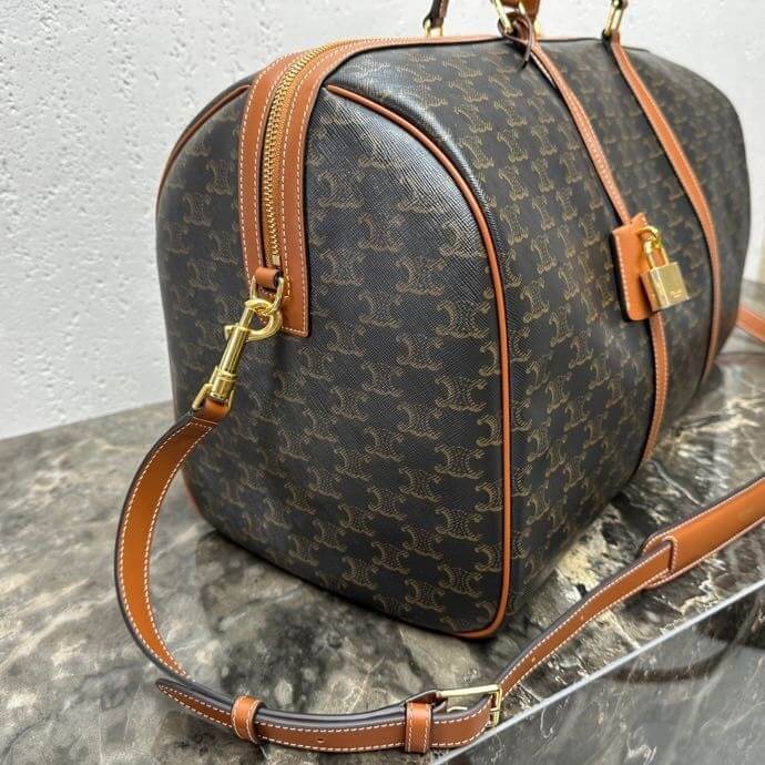Ce**e large travel bag in logo print and calfskin