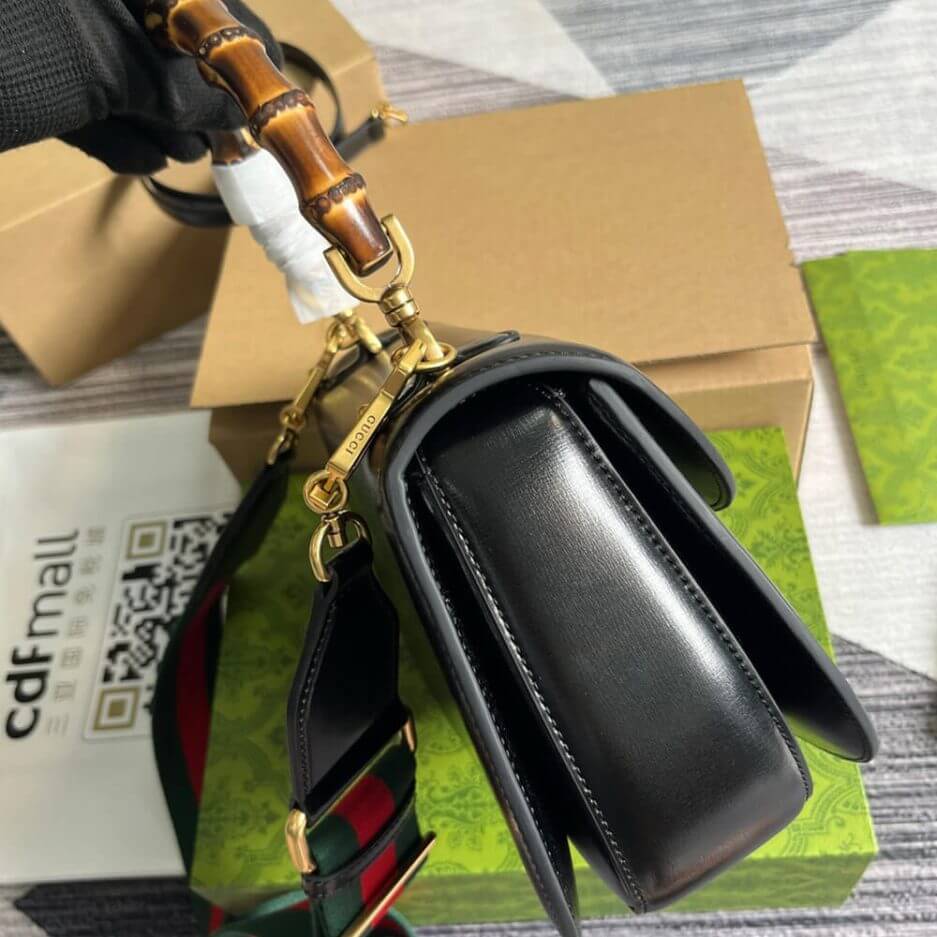 G*u*i bamboo 1947 medium top handle bag