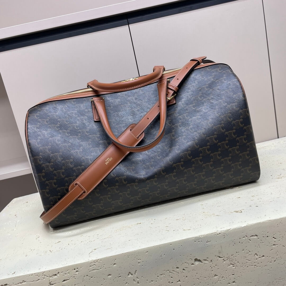 Ce**e medium duffle bag in logo-print calfskin
