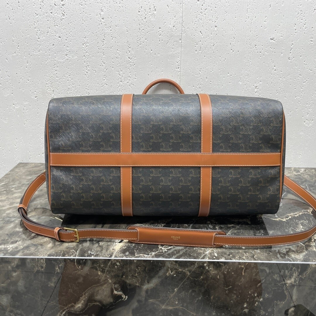 Ce**e medium duffle bag in logo-print calfskin