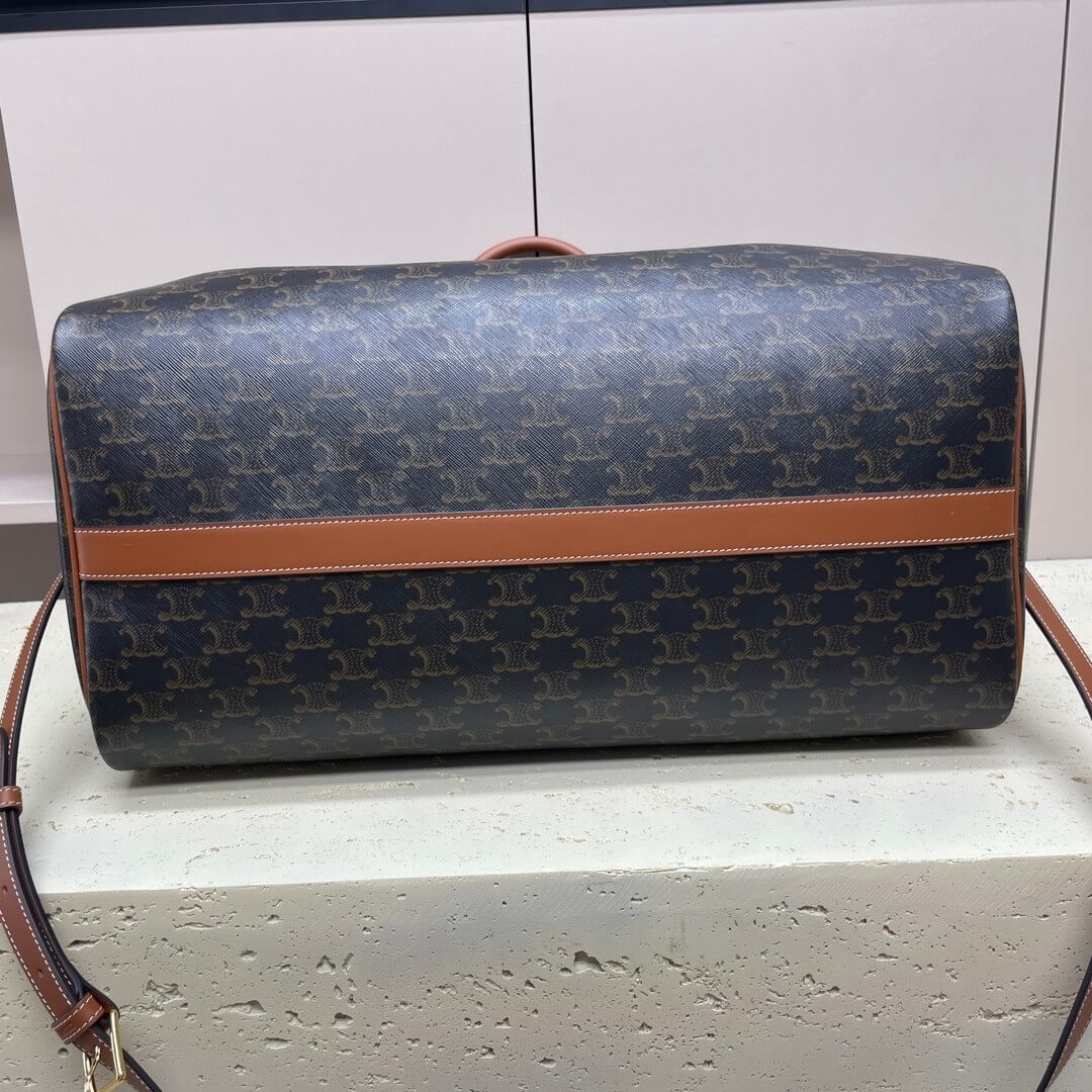 Ce**e medium duffle bag in logo-print calfskin