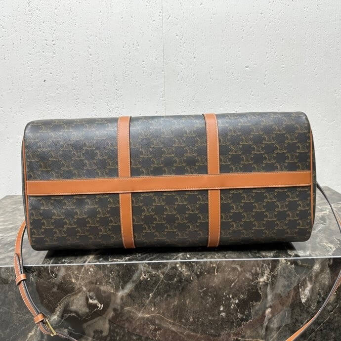 Ce**e large travel bag in logo print and calfskin
