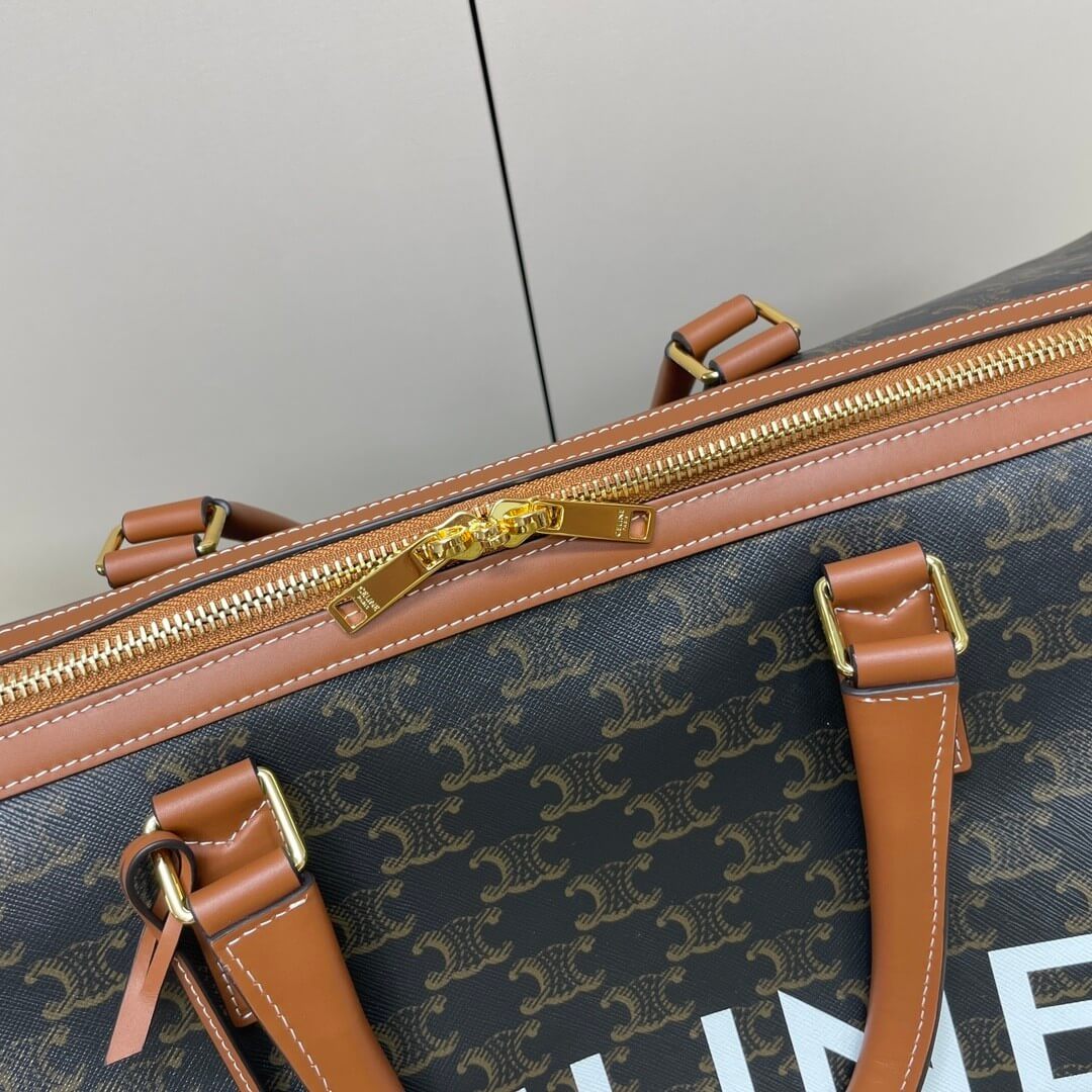 Ce**e medium duffle bag in logo-print calfskin