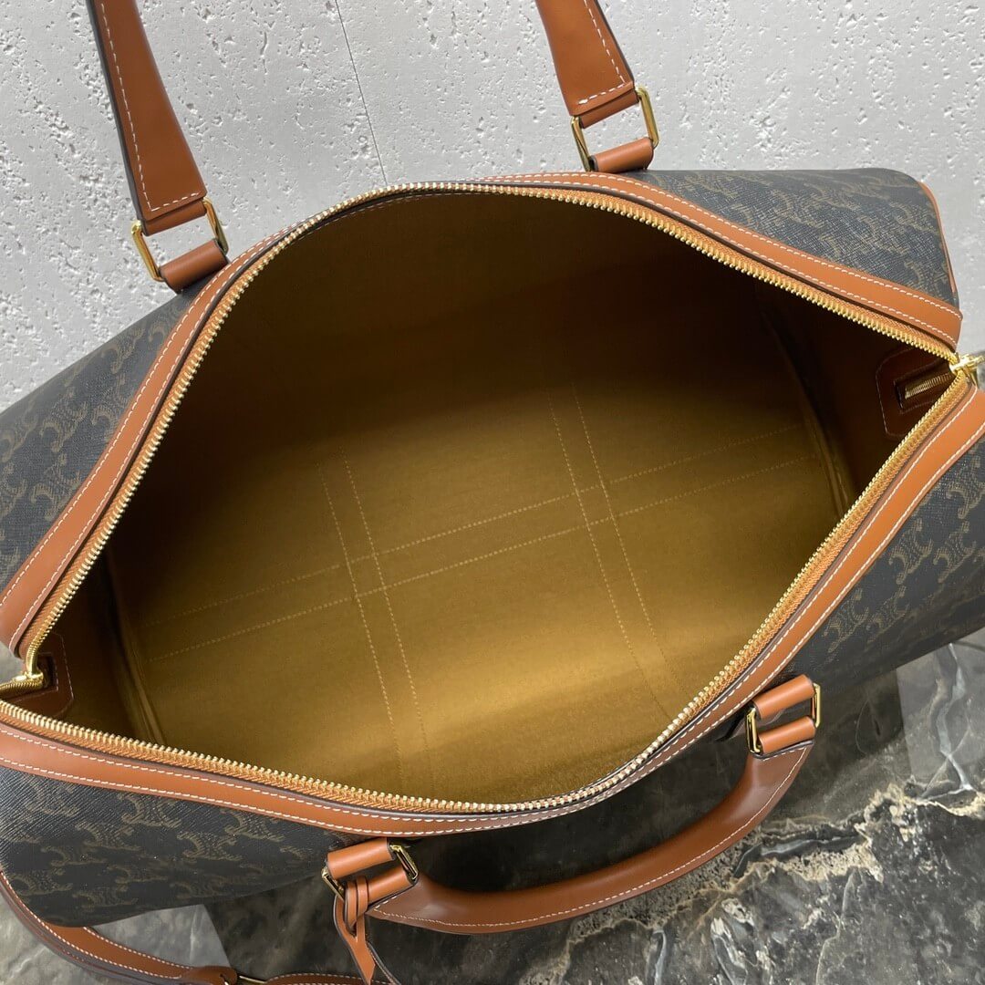 Ce**e medium duffle bag in logo-print calfskin