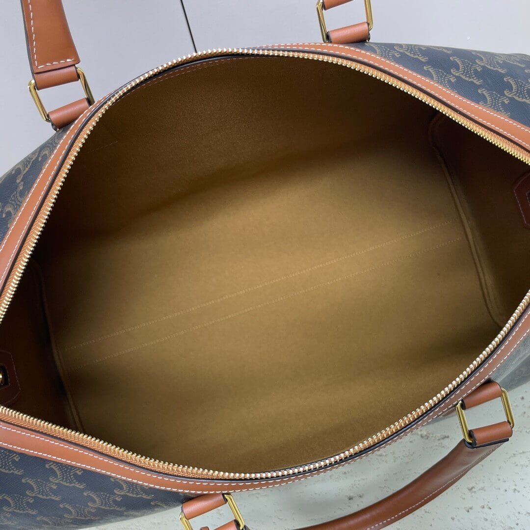 Ce**e medium duffle bag in logo-print calfskin